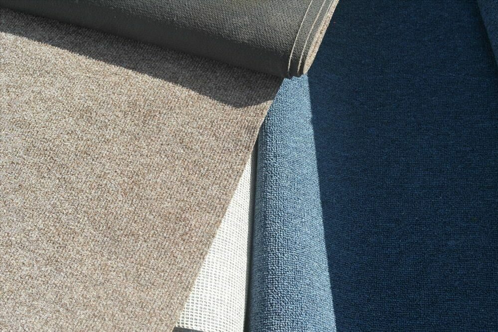 В чем разница между тафтинговым и тканым ковром?